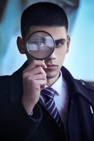 Detective with Magnifying Glass